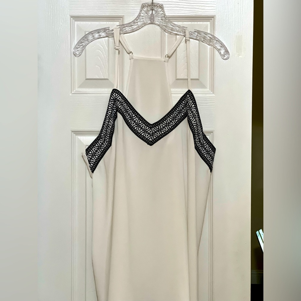 Spaghetti strap T-back top.  Size: XL BUST: 21” LENGTH:24 to top of blouse.